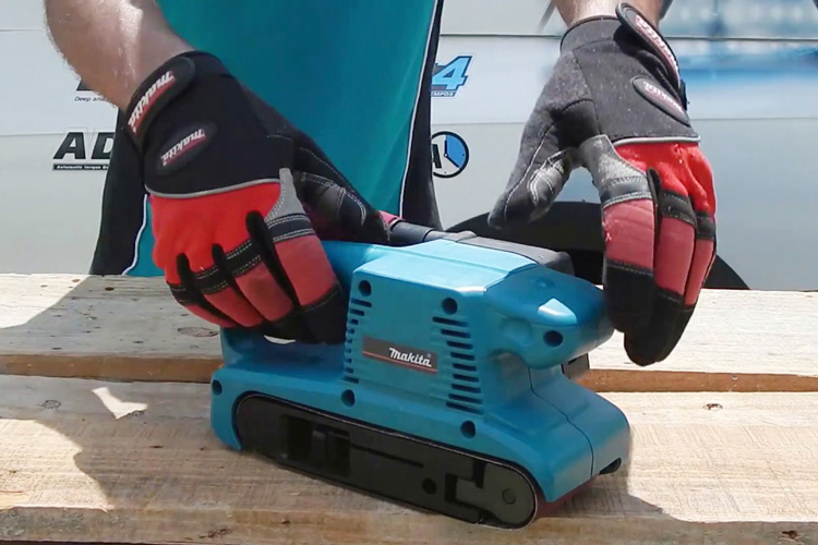 Máy chà nhám băng 650W Makita 9910